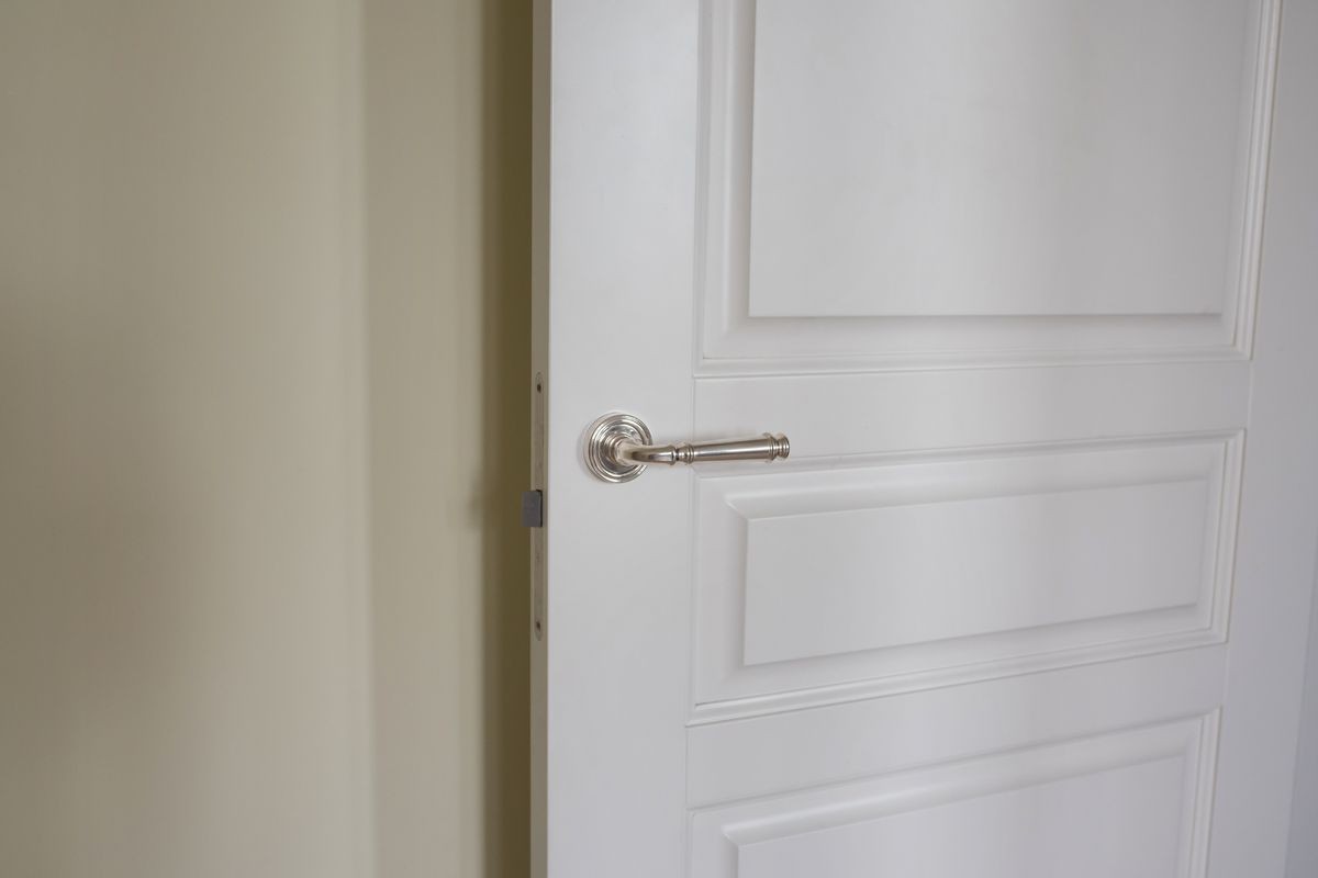 White door with the silver handle